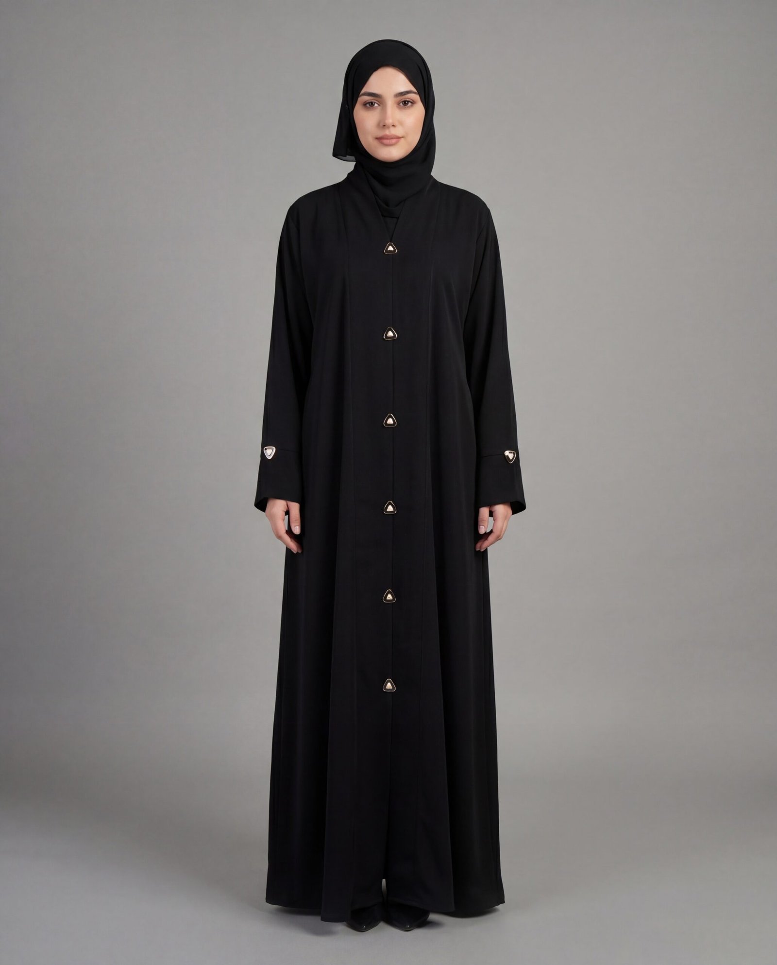 Front view of a black Prada Chodi Patti abaya by Malik Abaya featuring intricate wide-border (Chodi Patti) detailing on the sleeves and hem, crafted from premium Prada fabric.